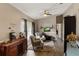 Comfortable living room featuring wood floors, vaulted ceilings, and neutral decor at 2816 Manor Hill Dr, Brandon, FL 33511