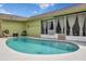 Inviting backyard with a refreshing pool, comfortable seating, and a relaxing ambiance perfect for outdoor enjoyment at 2816 Manor Hill Dr, Brandon, FL 33511