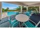 Enjoy breathtaking ocean views from this spacious balcony, perfect for outdoor dining and relaxation at 300 S Florida Ave # 200J, Tarpon Springs, FL 34689