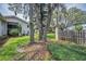 A tranquil outdoor setting with lush greenery and mature trees, creating a serene environment at 300 S Florida Ave # 200J, Tarpon Springs, FL 34689