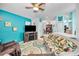 Comfortable living room with entertainment center and seating at 300 S Florida Ave # 200J, Tarpon Springs, FL 34689