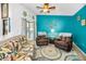 Relaxing living room features plush seating and balcony access at 300 S Florida Ave # 200J, Tarpon Springs, FL 34689