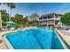 Spacious pool area with plenty of seating, perfect for relaxing and enjoying the Florida sunshine at 300 S Florida Ave # 200J, Tarpon Springs, FL 34689