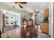 Spacious kitchen with wood-look tile floors, stainless steel appliances, and light green wall paint at 308 Jeanal Pl, Tampa, FL 33612