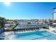 Enjoy the view of the community pool and harbor from this home at 3122 Christophers Watch Ln, Ruskin, FL 33570