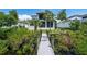 Picturesque view from the backyard dock of this stunning home at 3122 Christophers Watch Ln, Ruskin, FL 33570