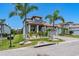 Charming two-story home with landscaped yard, paver driveway, and a two car garage at 3122 Christophers Watch Ln, Ruskin, FL 33570
