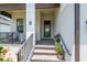 Welcoming front porch with brick steps and railing, perfect for enjoying the outdoors at 3122 Christophers Watch Ln, Ruskin, FL 33570