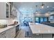 A beautifully designed kitchen with stainless appliances overlooks the dining and living areas at 3122 Christophers Watch Ln, Ruskin, FL 33570