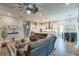 Comfortable living room open to the kitchen and dining areas at 3122 Christophers Watch Ln, Ruskin, FL 33570