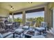 Outdoor seating area with BBQ and waterfront views at 3122 Christophers Watch Ln, Ruskin, FL 33570
