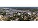 An aerial view of a neighborhood with tree-lined streets and nearby commercial areas at 3212 56Th N Ave, St Petersburg, FL 33714