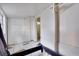 Bedroom featuring white walls, tile flooring, and doorway leading to another area at 3212 56Th N Ave, St Petersburg, FL 33714