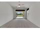 Bright, spacious bedroom with access to a screened-in porch, ideal for relaxation at 3333 Michener Pl, Plant City, FL 33566