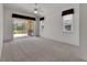 Bright, spacious bedroom with access to the screened-in porch through sliding glass doors at 3333 Michener Pl, Plant City, FL 33566