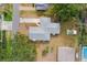 Bird's eye view of the house showing the roof and the surrounding lot and neighborhood at 3417 1St W Ave, Bradenton, FL 34205