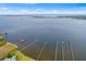 This shot captures a waterfront neighborhood with homes near docks and a bay at 3417 1St W Ave, Bradenton, FL 34205