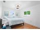 This bedroom has hardwood floors, natural light, and sailboat decorations throughout the room at 3417 1St W Ave, Bradenton, FL 34205