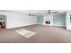 Bright and open living room with a fireplace, large windows, and ample space for entertaining at 3417 1St W Ave, Bradenton, FL 34205