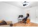 This office is designed with hardwood floors, natural light, a closet, and an office chair at 3417 1St W Ave, Bradenton, FL 34205