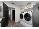 Well-equipped laundry room with modern appliances, ample counter space, and stylish decor at 4009 Carrollwood Village Dr, Tampa, FL 33618