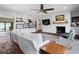Cozy living room with fireplace, built-in shelving, and comfortable seating at 4009 Carrollwood Village Dr, Tampa, FL 33618