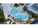 Stunning aerial view of resort-style pools, lush landscaping, and modern condominium buildings at 449 S 12Th St # 2205, Tampa, FL 33602