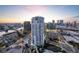 Stunning aerial view of a modern condo building in the city with water views, offering a luxurious urban lifestyle at 449 S 12Th St # 2205, Tampa, FL 33602