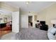 Bright bedroom features a ceiling fan, an ensuite bathroom, and an adjacent living and dining area at 449 S 12Th St # 2205, Tampa, FL 33602