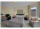 Relaxing bedroom features a comfortable bed, soft lighting, and a cozy chair with cityscape views at 449 S 12Th St # 2205, Tampa, FL 33602