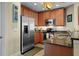 The kitchen includes stainless steel appliances, granite countertops, and ample cabinet space at 449 S 12Th St # 2205, Tampa, FL 33602