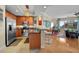 Open kitchen with stainless steel appliances, granite countertops, and a breakfast bar, perfect for modern living at 449 S 12Th St # 2205, Tampa, FL 33602