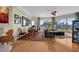Bright living room featuring hardwood floors, large windows with cityscape views, and a comfortable seating area at 449 S 12Th St # 2205, Tampa, FL 33602