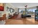 Bright living room featuring hardwood floors, large windows with cityscape views, and a comfortable seating area at 449 S 12Th St # 2205, Tampa, FL 33602