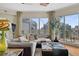 Inviting living room features a spacious seating area, large windows with cityscape views, and ample natural light at 449 S 12Th St # 2205, Tampa, FL 33602