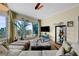 Comfortable living room featuring a spacious seating area, large windows with cityscape views, and access to the balcony at 449 S 12Th St # 2205, Tampa, FL 33602