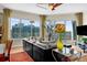 Bright living room featuring a cozy seating area, large windows with beautiful cityscape views, and ample natural light at 449 S 12Th St # 2205, Tampa, FL 33602