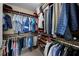 Well-organized walk-in closet with ample shelving and hanging space for clothes and accessories at 449 S 12Th St # 2205, Tampa, FL 33602