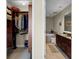 View of walk-in closet that connects to a bathroom, with custom shelving and storage solutions at 449 S 12Th St # 2205, Tampa, FL 33602
