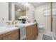Stylish bathroom features a dual sink vanity, quartz countertop, and modern fixtures at 4681 70Th N Ave, Pinellas Park, FL 33781