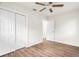 A well-lit bedroom features a closet and an open doorway at 4681 70Th N Ave, Pinellas Park, FL 33781