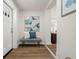 Welcoming entryway with a decorative bench, stylish decor, and an inviting glimpse into the home's interior at 4681 70Th N Ave, Pinellas Park, FL 33781