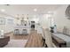 Bright, open-concept kitchen featuring a central island, stainless steel appliances, and modern finishes at 4681 70Th N Ave, Pinellas Park, FL 33781