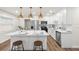 Bright and modern kitchen with an island, stainless steel appliances, and ample counter space at 4681 70Th N Ave, Pinellas Park, FL 33781