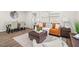 Cozy living room features stylish furniture, natural light, and seamlessly connected dining area at 4681 70Th N Ave, Pinellas Park, FL 33781