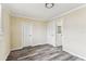 Bright bedroom features new floors, natural light, and multiple closets for ample storage at 5033 Tammy Ln, Holiday, FL 34690