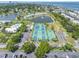 Aerial view of community tennis and recreation facilities at 5037 Starfish Se Dr # A, St Petersburg, FL 33705