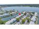 Aerial view of waterfront condos and a marina showing the location of a highlighted townhome at 5037 Starfish Se Dr # A, St Petersburg, FL 33705