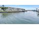 Waterfront condos and boat docks on a sunny day at 5037 Starfish Se Dr # A, St Petersburg, FL 33705