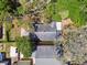 An aerial view of the home showcasing the roof, landscaping, and backyard at 5806 N 9Th St, Tampa, FL 33604